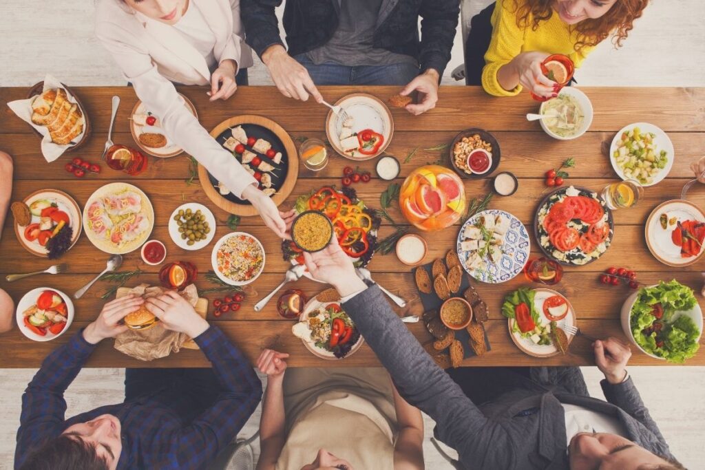 Friends eating around the table