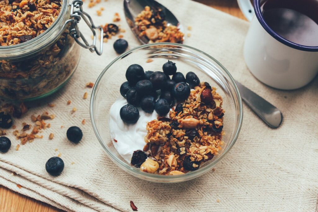 Vegan granola with yoghurt and blueberries