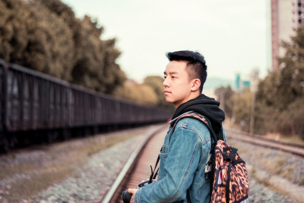 Man with camera and backpack