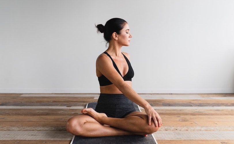 Woman practising yoga