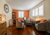This is an image of a calm and comfortable counselling room used for face-to-face therapy sessions.
