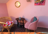Pink counselling room based in a vibrant leafy art centre