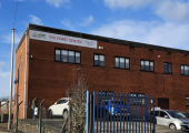 GTA Counselling office building, 2 floor red brick building with a Print Centre banner