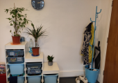 counselling space is cosy and calm, in blue, white and wood hues