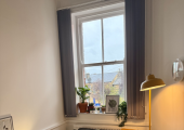 A cosy therapy room with soft lighting