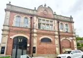A striking old building, the outside of a therapy room premises