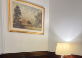 This is an image of a antique lamp on an antique table inside my waiting room for therapy
