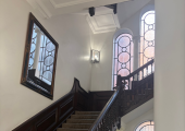 The beautiful, grand stairway up to my therapy room in Bank