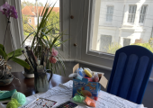 This is an image of a table with art materials on it