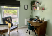 The chair by the window is generally where I would sit though I'm not possessive about it!