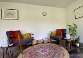 Comfortable, quiet therapy room.