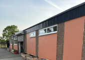 The back of our lovely, colourful office waiting for the planters to bloom