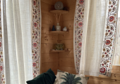 1 chair with cushions on it