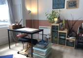 Desk area, and resources such as sand, craft, and fabric