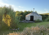 The yurt in evening sunlight