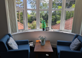 The counselling room is lovely, spacious, overlooking the beautiful gardens.