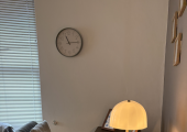 My desk, the clock you'll be able to see and warm lighting.