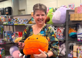 This is a photo of me, choosing one of many 'squidgies' that you can find in my counselling room!