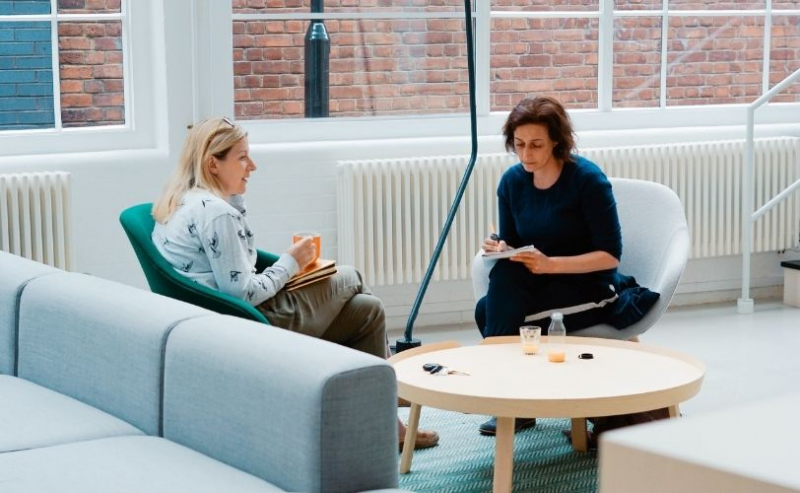 Two women chatting