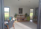 Light and airy space, looking across open fields.