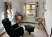 My therapy room overlooking open fields and woodland