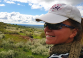 I am a determined action-taker. Here's half-way shot, along the Camino de Santiago (930km pilgrimage on foot!)
