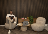 Chris Salt, ADHD coach at ADHdifference Coaching, sitting and reading