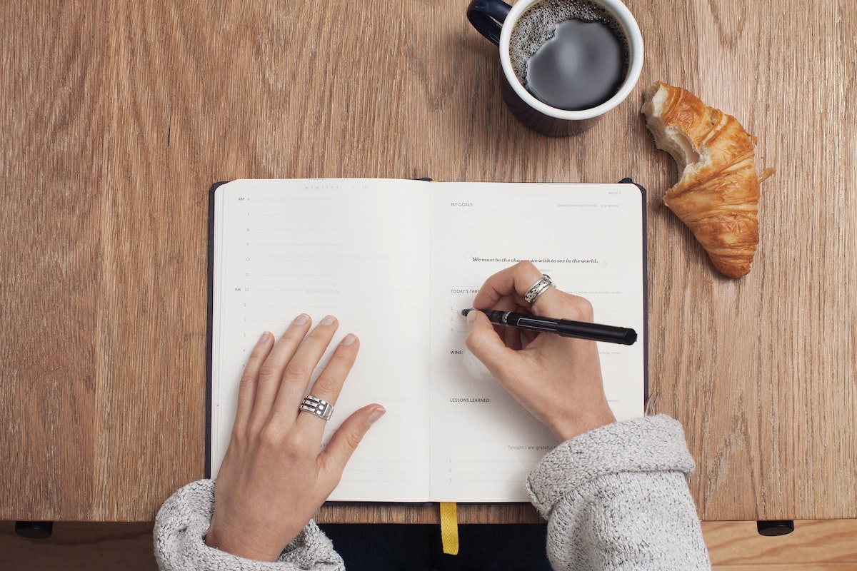 woman writing in journal,Maintaining Well Being