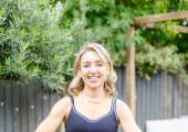 Personal trainer holding a kettle bell