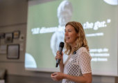 Claire Barnes speaking about gut health, nutrition and the gut&ndash;mind connection at a health and wellbeing event.