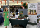 Claire Barnes, founder of The Happy Nutrition Co., at a local food and wellbeing event in the South West, sharing her approach to gut health and nutritional therapy.