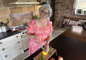 Nutritionist Lisa Picken in the kitchen chopping vegetables