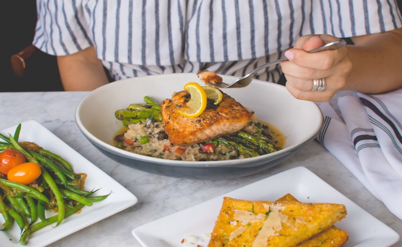 Woman eating salmon