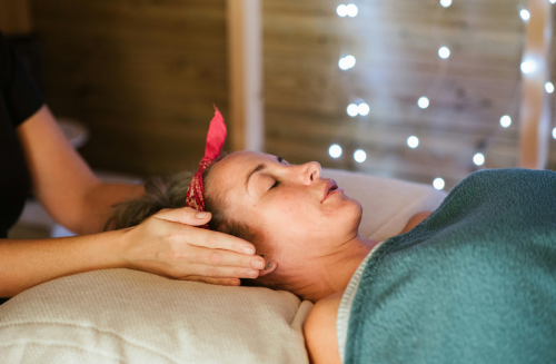 woman lying on bed