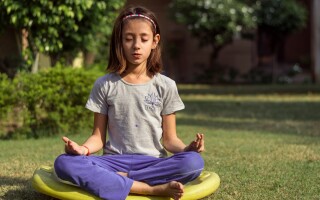 Yoga for families: Simple poses (and their benefits) to get you started